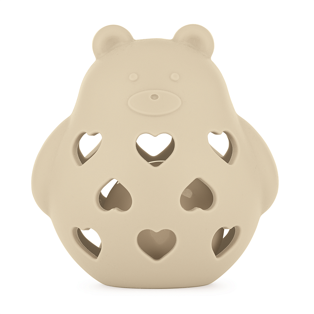 PETITE&MARS Hračka silikónová s hrkálkou bear basil desert sand 0m+